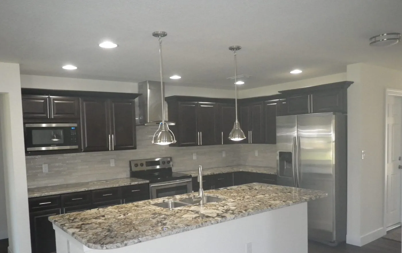 Kitchen with granite counters and stainless appliances